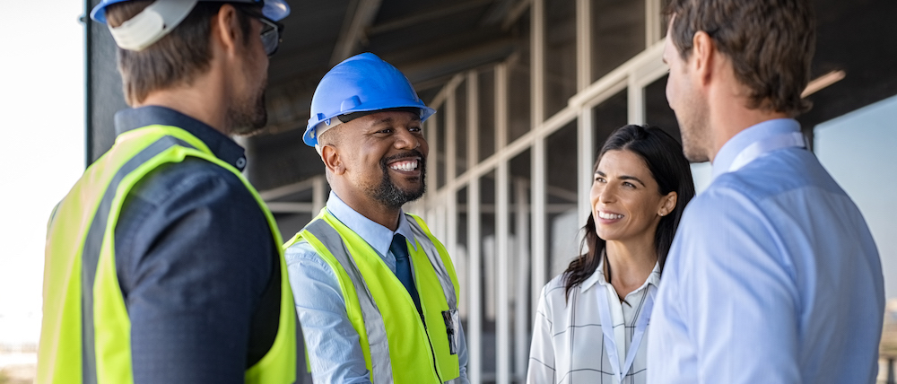 Builders meeting with quantity surveyors.