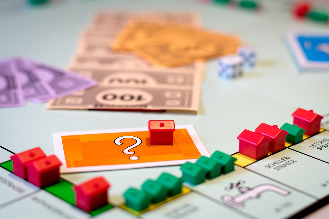 A Monopoly game board with a question mark highlighted, indicating a mystery or decision point in the game.