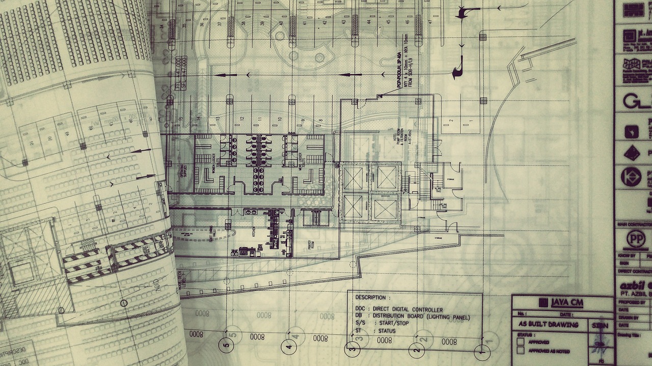 A piece of paper featuring intricate architectural drawings, illustrating various design elements and structural details.