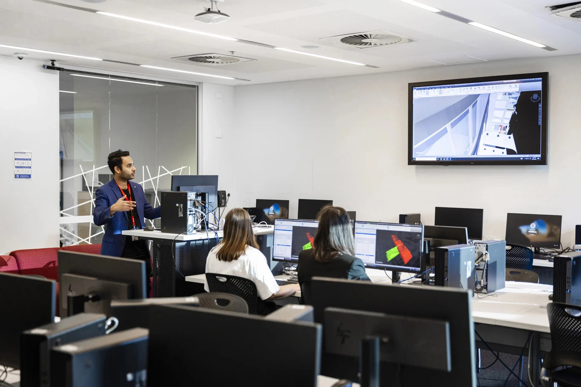 Man teaching class at University of Technology Sydney.